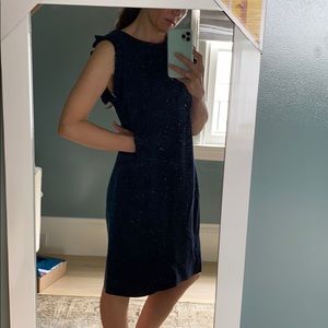 Mother of pearl navy dress with ruffle detail